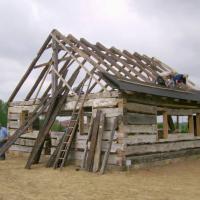 The Tschantz Log Cabin being reconstructed at the Sonnenberg Village